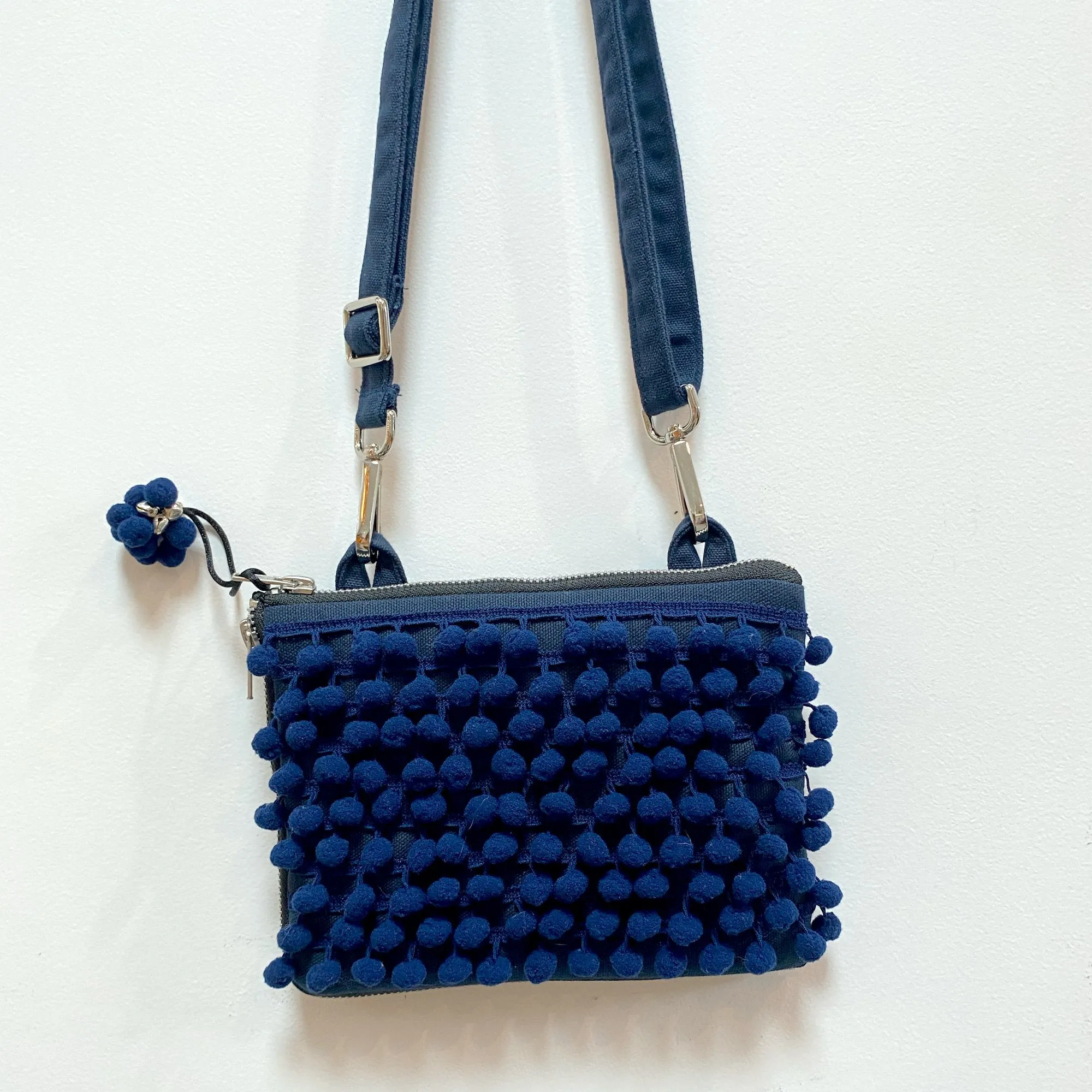 Ha Leh Handmade Pom Pom Mini Crossbody Bag in Navy